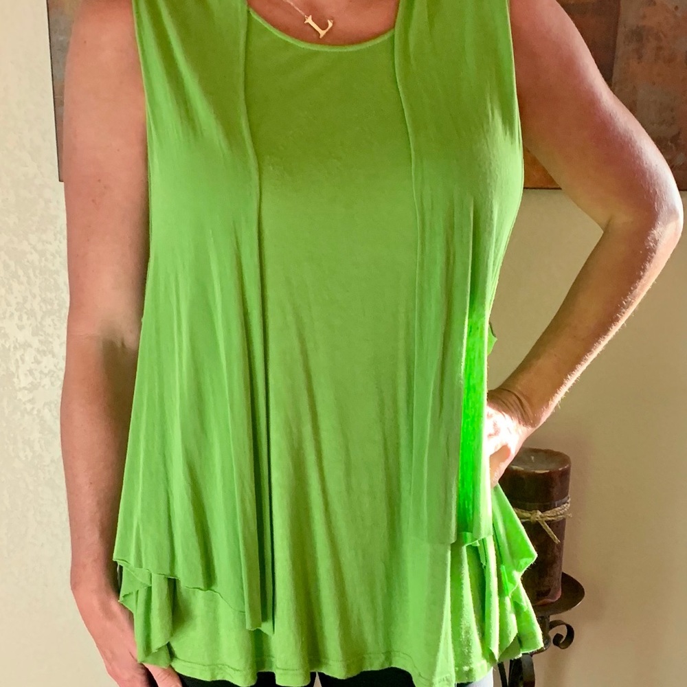 Green sleeveless blouse